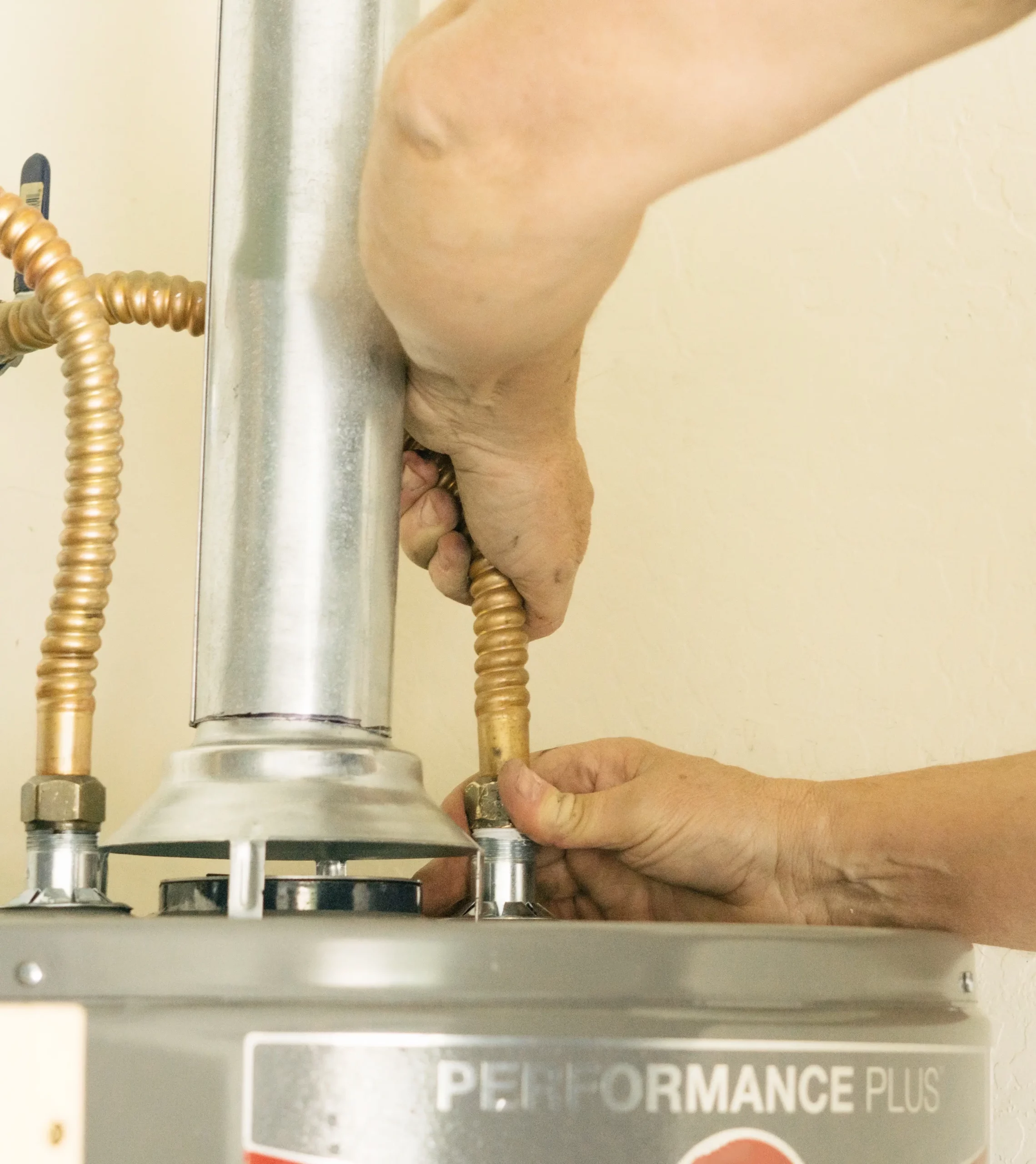 adult-male-hands-on-water-line-going-into-a-hot-wa-2025-01-10-15-20-28-utc