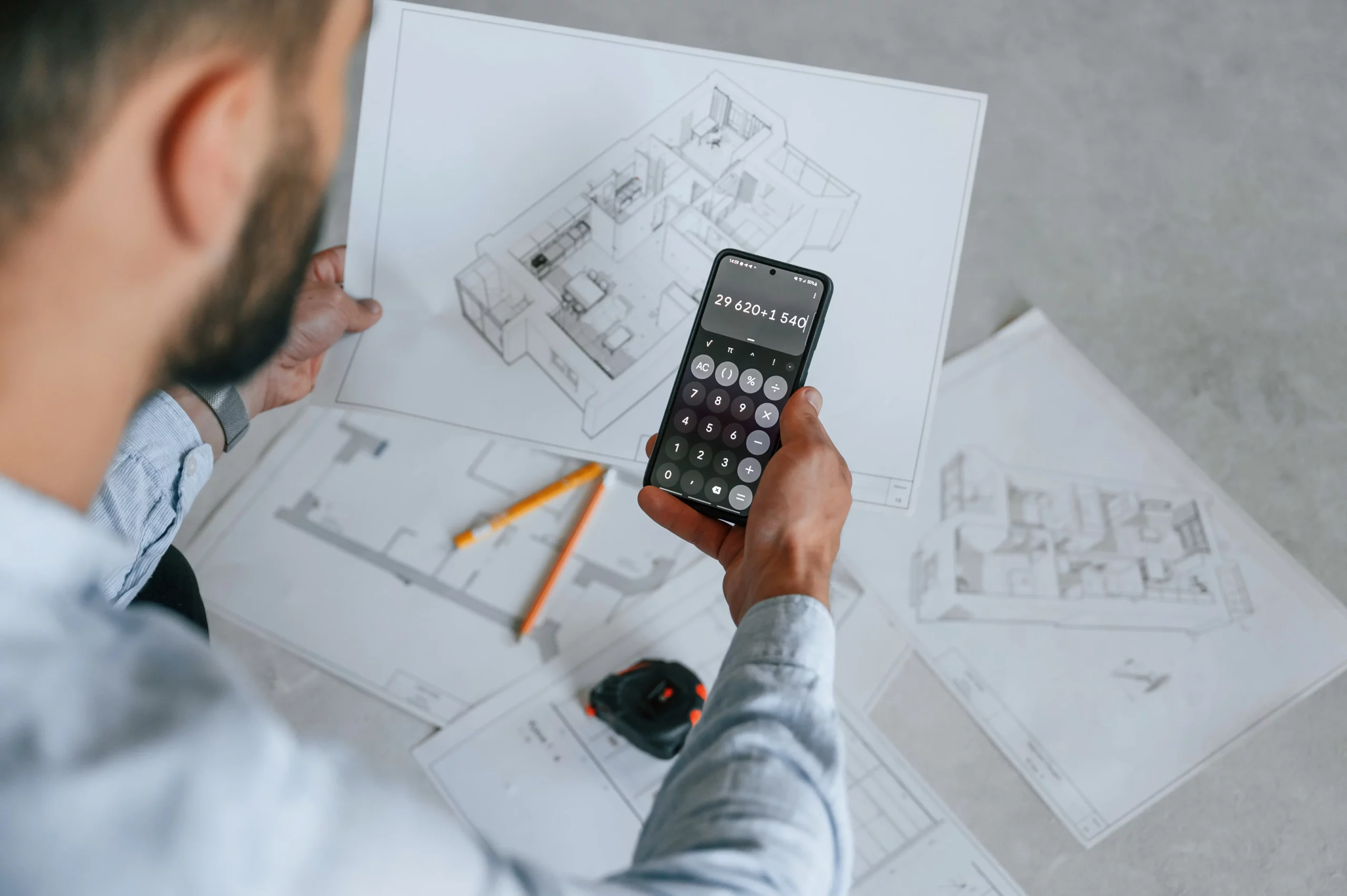 calculating-numbers-by-using-smartphone-the-man-i-2023-11-27-04-53-56-utc
